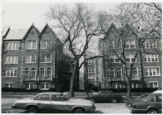 September 1983 - Wide view of two apartment complexes with shared courtyard. 
