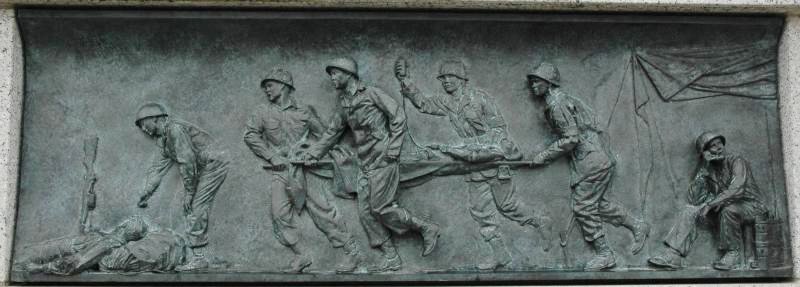 24 bas-relief panels tell stories from the war, such as this image of a field hospital. Photo courtesy of the National Park Service.