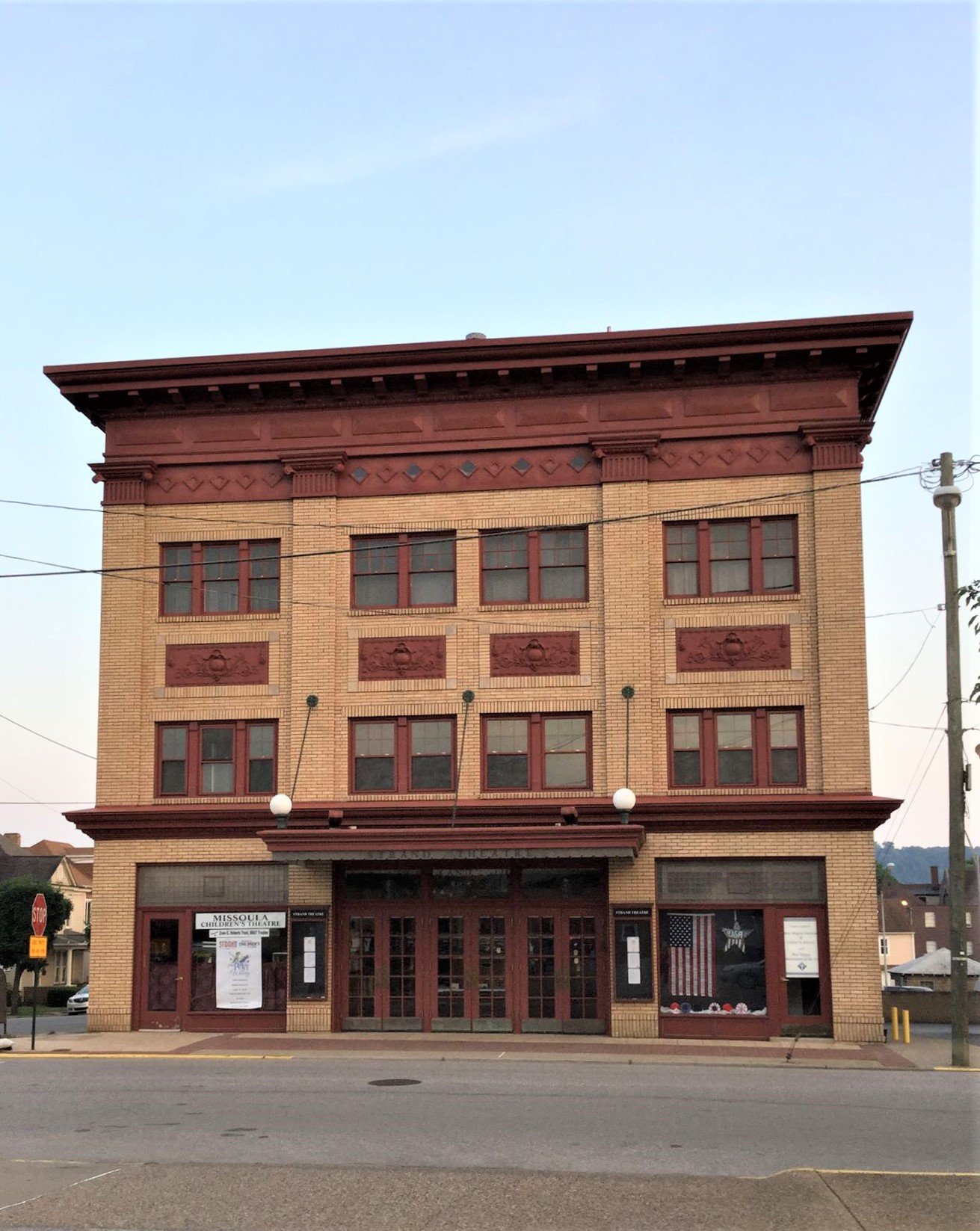 The exterior of the Strand Theater looking south across 5th Street and Jefferson Avenue.