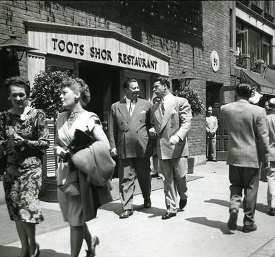 Bernard "Toots" Shor walking outside of his restaurant on West 51st St. with New York Yankees legend Joe DiMaggio