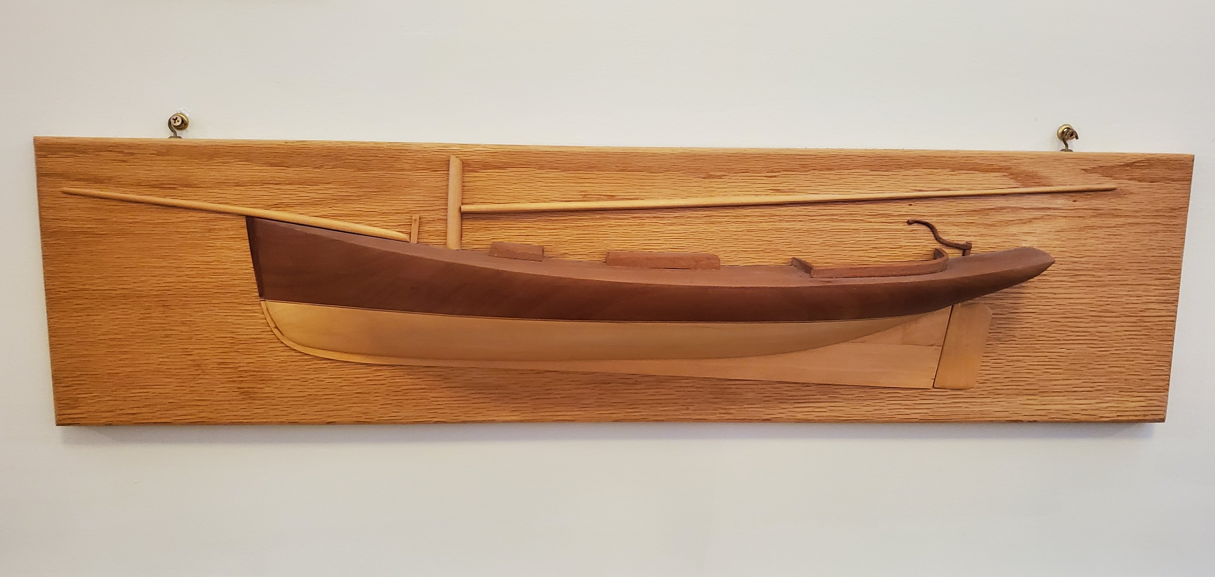 Half models allow for planned boats to be seen in three dimensions before construction. If the design is used, the half model serves as a pattern to work from.