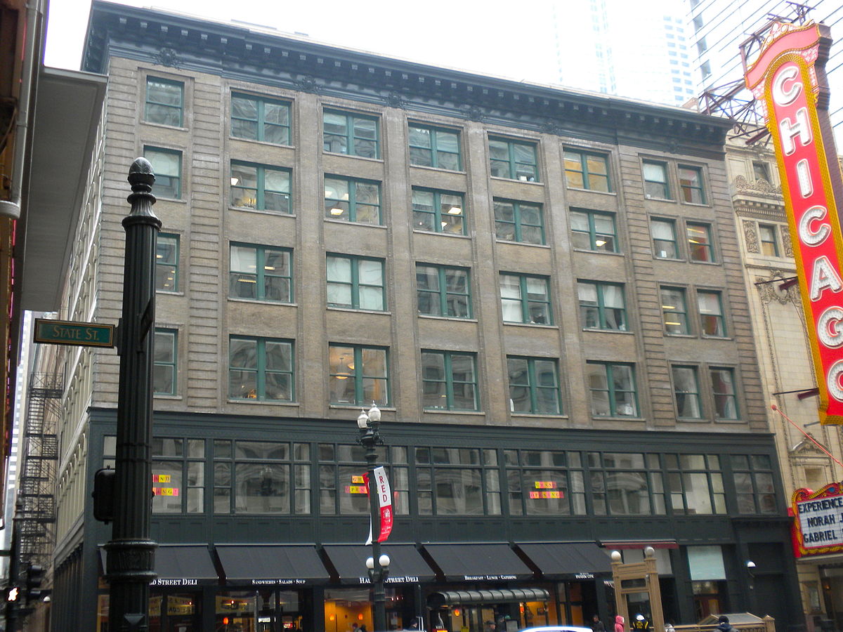 Page Brothers Building as viewed from State Street. The famous Chicago Theater, also on State, is located to its right (south) along State Street.