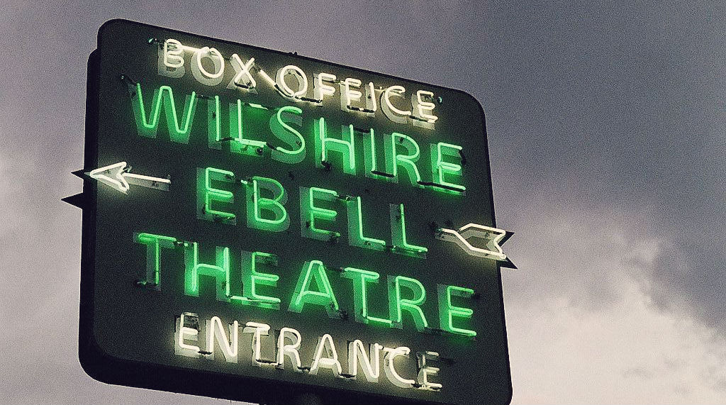 The vintage neon Wilshire Ebell Theatre sign