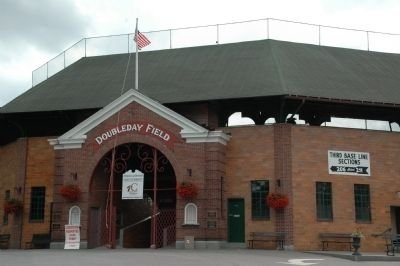 Photo showing the entrance to the grandstand behind home plate. From here, the Works Progress Administration marker can be seen just to the right of the main entrance. 