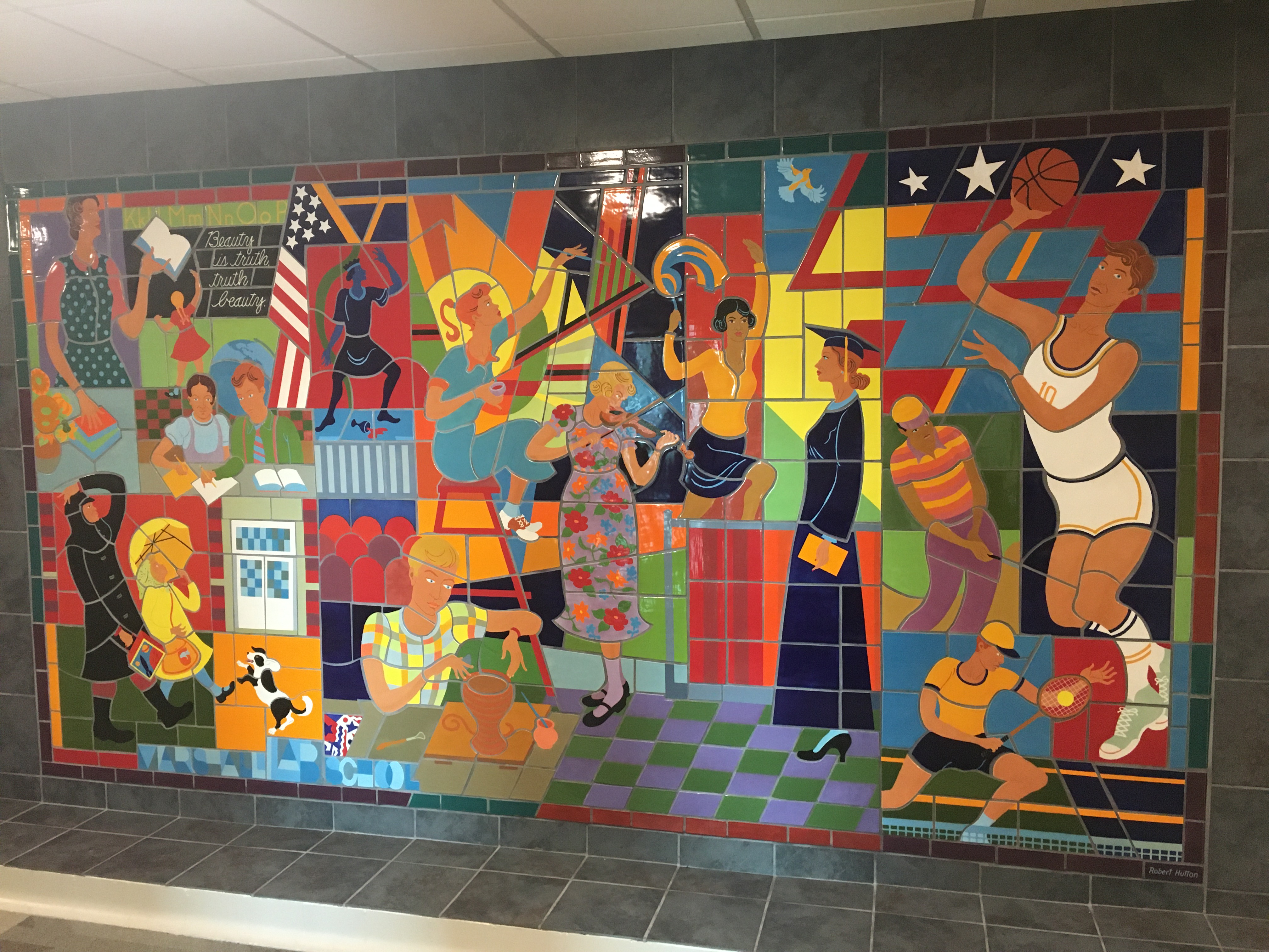 The Marshall Lab School Puzzle Tile Memorial mural was created during the 2019 renovations by Robert P. Hutton to commemorate the historic role of Jenkins Hall as a lab school.