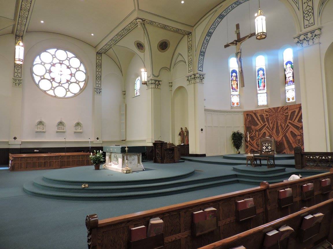 A wonderful view of what the members of the Church get to experience every week. In the back right, you can see a large wood carving that has been added since the opening of the church in 1892. 