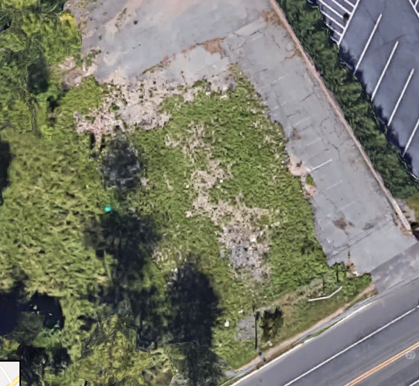 This is an aerial view of all that is left in 2018. If you look closely, towards the road you can see the white door frame is all that remains.