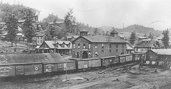 Image of MacDonald Company Store built in 1893 and was made of wood framing. This store would later burn to the ground in 1925. It would reopen in the building which had originally housed Reis Candy Kitchen.