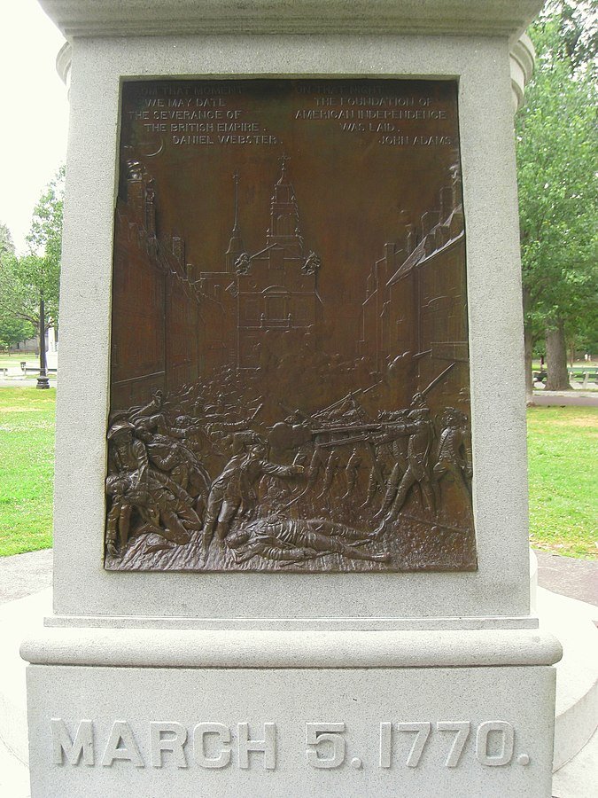 Relief of Paul Revere's famous engraving of the scene, depicting Crispus Attucks laying dead while British soldiers continue to fire into the crowd. 