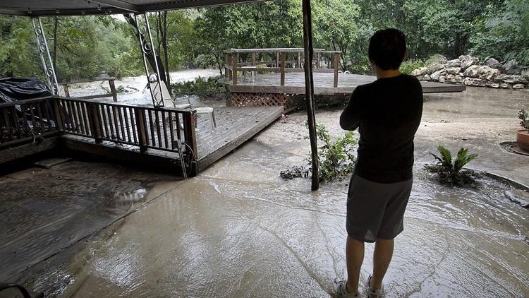 A home being flooded in Radam Circle during the 2013 Halloween flood.