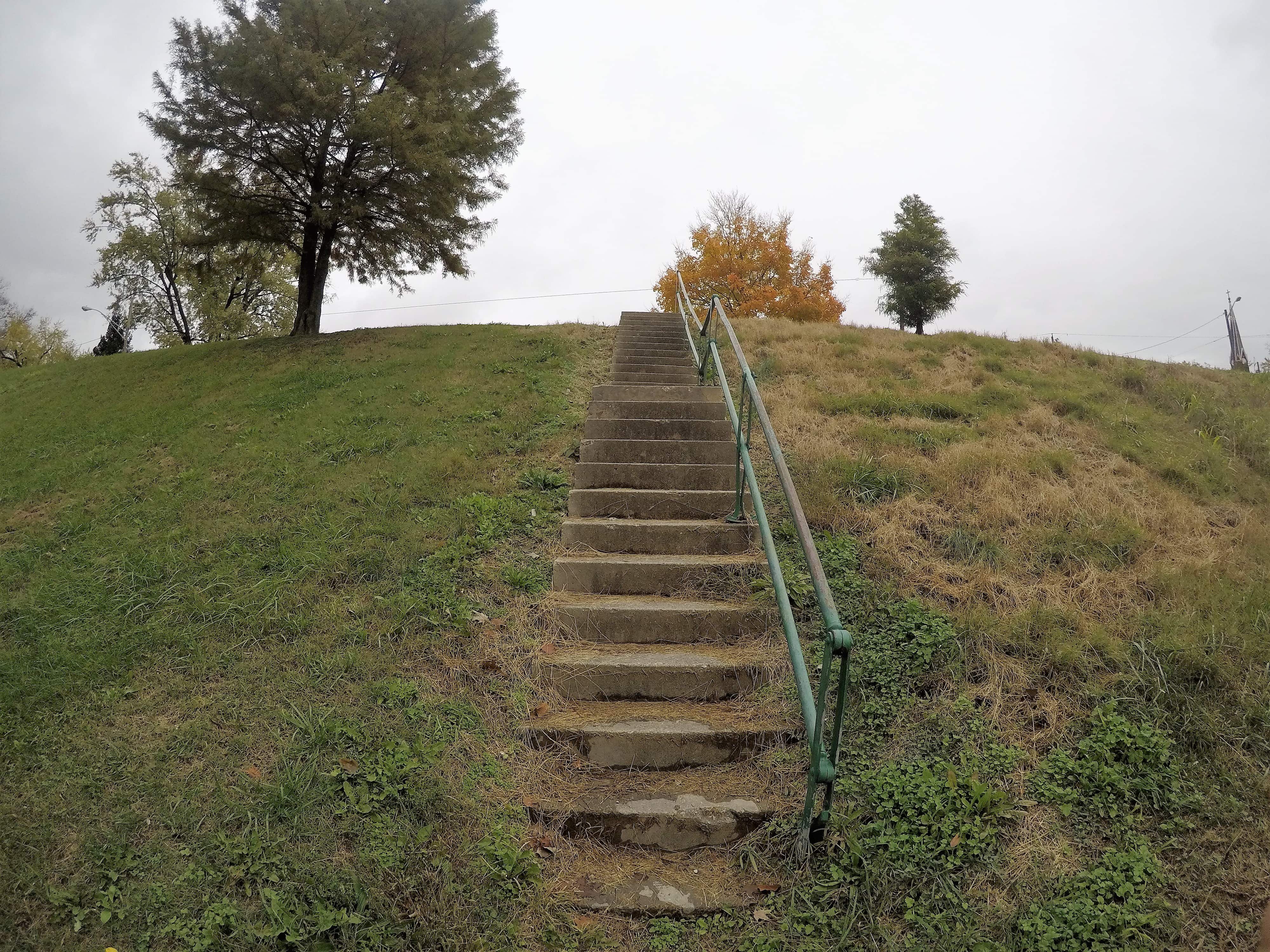 Fairbanks Avenue, leading to Price Hill, sits at the top of this staircase. Both Fairbanks Avenue and River Road were raised 15 feet to prevent flooding during improvements. The elevation of the roads is indicated here.