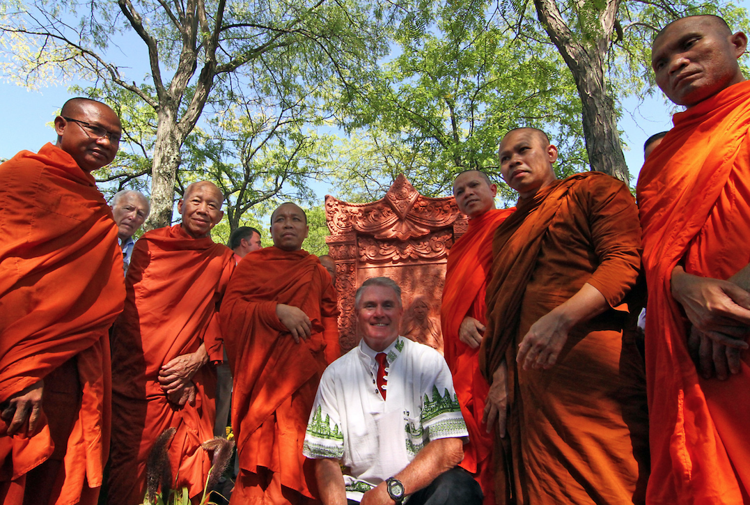 "Lowell City Councilor Rodney Elliott with Community of Khmer Buddhist Monks and monks from Glory Buddhist Temple after unveiling of Khmer Monument in front of Lowell City Hall."
THE SUN Photo by David H. Brow