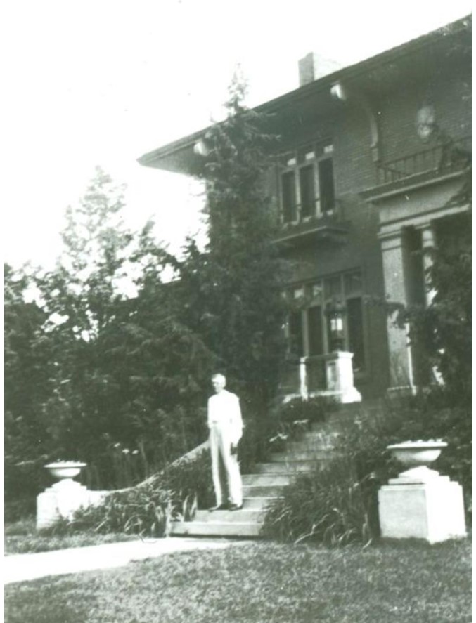 Frederick A. Anton on front steps of Anton-Woodring House in 1930 photo (KSHS)