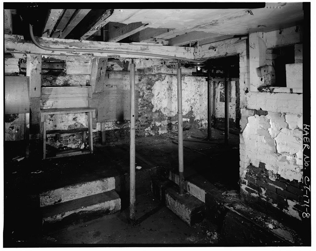 The first floor of Penfield Reef Lighthouse circa 1950. The lighthouse experienced neglect in the mid-20th century before seeing renovations in the 1990s and 2000s.