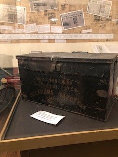 This box would have been owned by a family for the delivery person to put the paper in for safe keeping against the weather.
