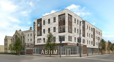 The museum will be located on the ground floor of this new apartment building.