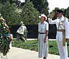 "A Canadian officer salutes after placing a wreath at the Korean War Veterans Memorial in Washington. Representatives of the 22 UN allies who fought in the Korean War participated in the ceremony." (Photo by Rudi Williams)