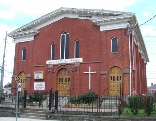 Currently owned by the Apostolic Worship Center, this structure once housed Congregation Adath Israel.