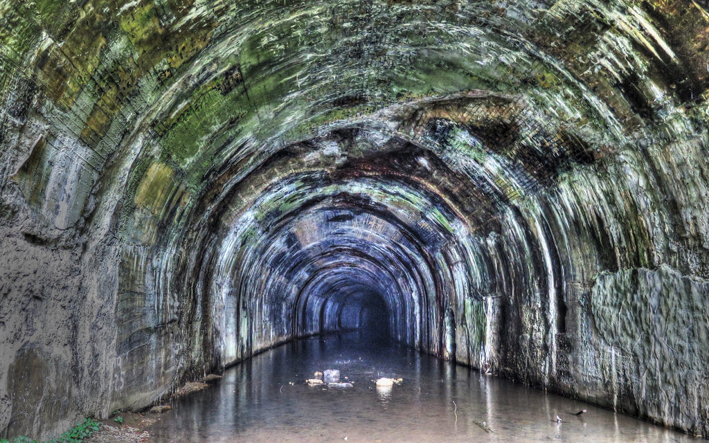 This shows the inside of the deserted tunnel in which it was flooded due to the fact it has been out of operations for nine years now. 