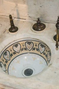 The sink of the Billiards Room washroom