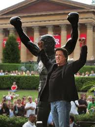 Actor Sylvester Stallone in front of the Rocky Sculpture.