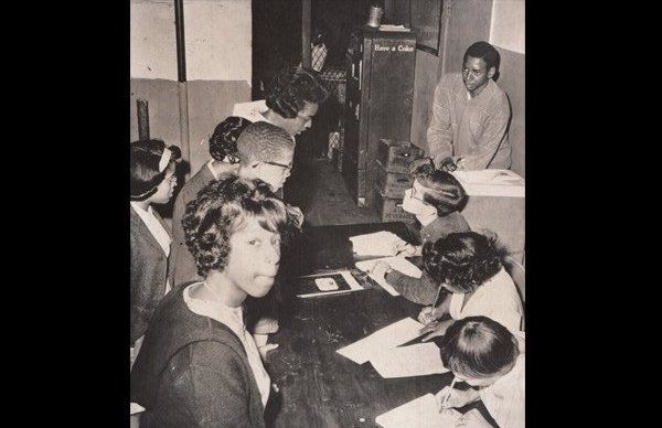 Students and their parents signing up for classes at St. Mark's Social Center.