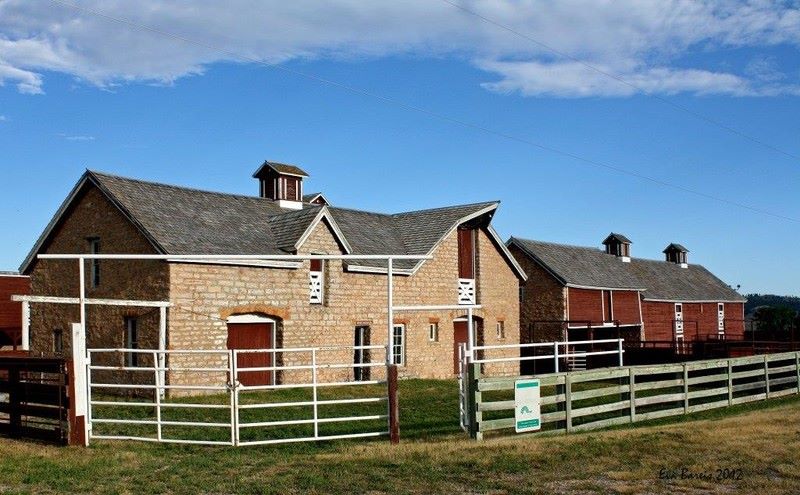 Henry Frawley built the Courtyard Barns in the late 1890s. They are unique in that they feature cut-stone horizontal siding.