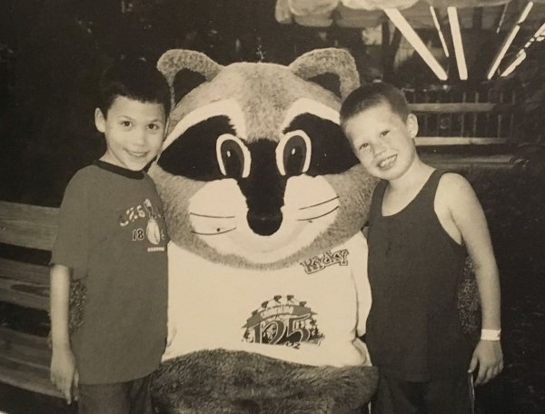 Two park-goers pose with Ricky Raccoon during a visit in 2002. Ricky is the mascot of Raccoon Lagoon, an area of the park dedicated to pint-sized guests.
"Croushore"