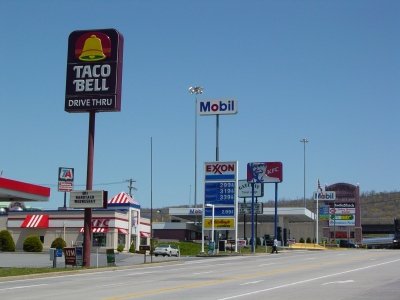 A far, front shot of the entrance of the Gateway Plaza Travel Center