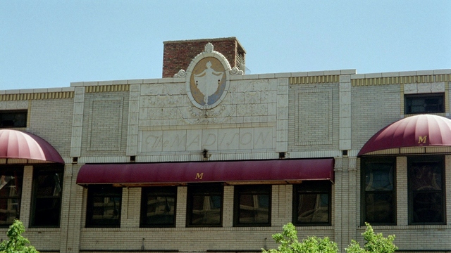 Madison Theater with name engraved in facade.