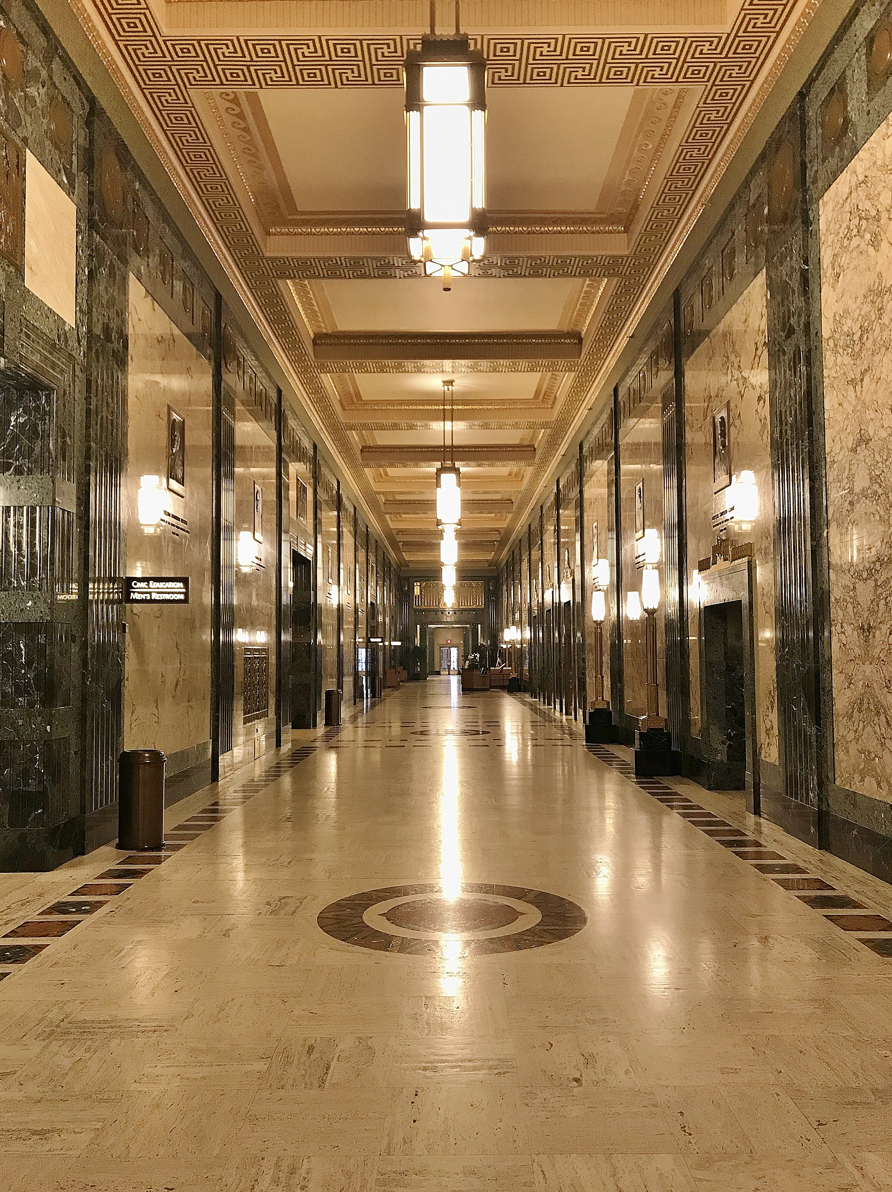 The Grand Concourse on the first floor is the main ciruclation space for visitors and employees. High on the walls are 19 bronze bas-reliefs created by four different artists. The portraits depict the eight presidents, nine U.S. Supreme Court justices, and two Speakers of the House of Representatives who hailed from Ohio (as of 1933).