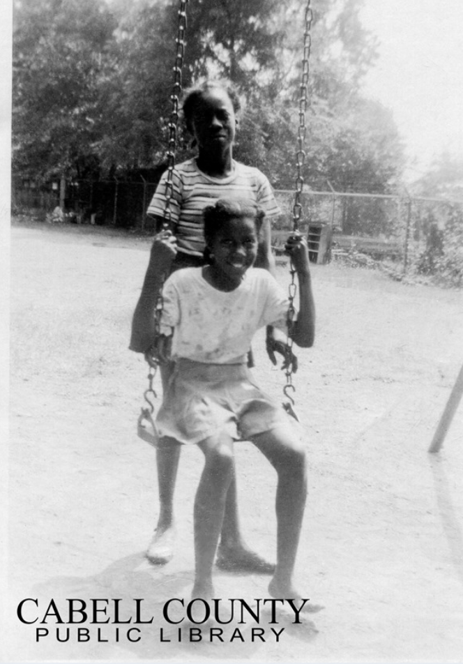 Girls at the Barnett School playground