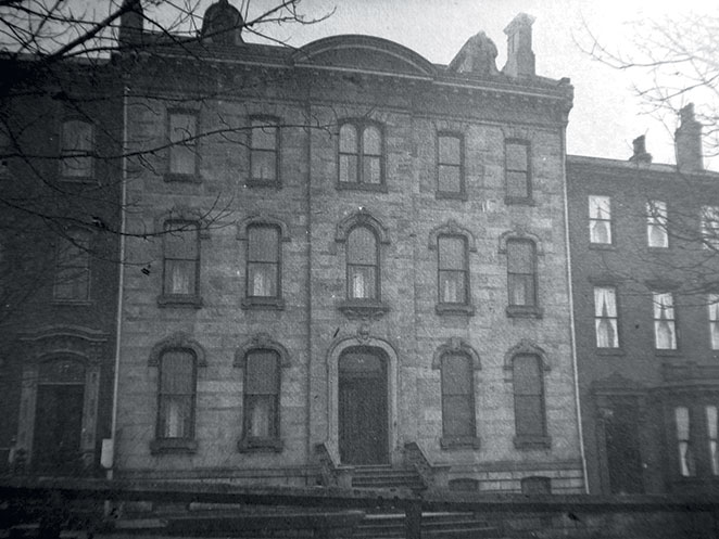 Holmes Hall in 1886/photo by William A. Caldwell Jr. Originally founded as a home for working Protestant boys. It was renamed Holmes Hall for Boys in 1915. After its closing, the organization continues to support similar organizations.