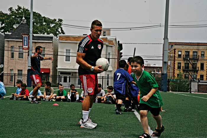 Soccer practice being held at Jose Marti field.