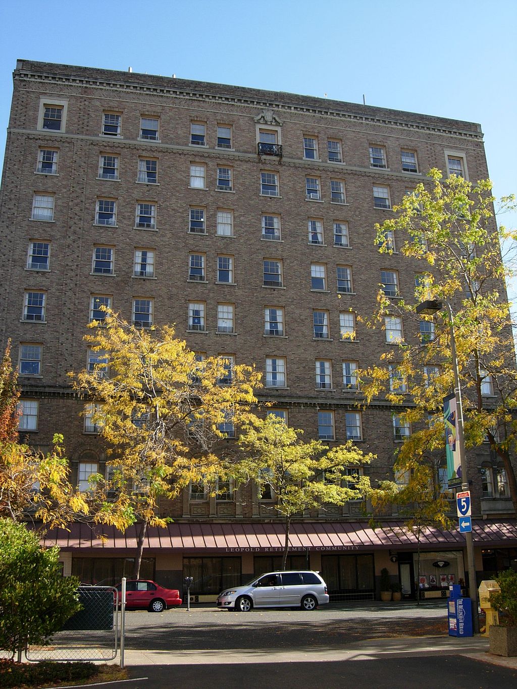 The 1929 addition of the Leopold Hotel, now known as Hotel Leo, was listed on the National Register of Historic Places in 1982.