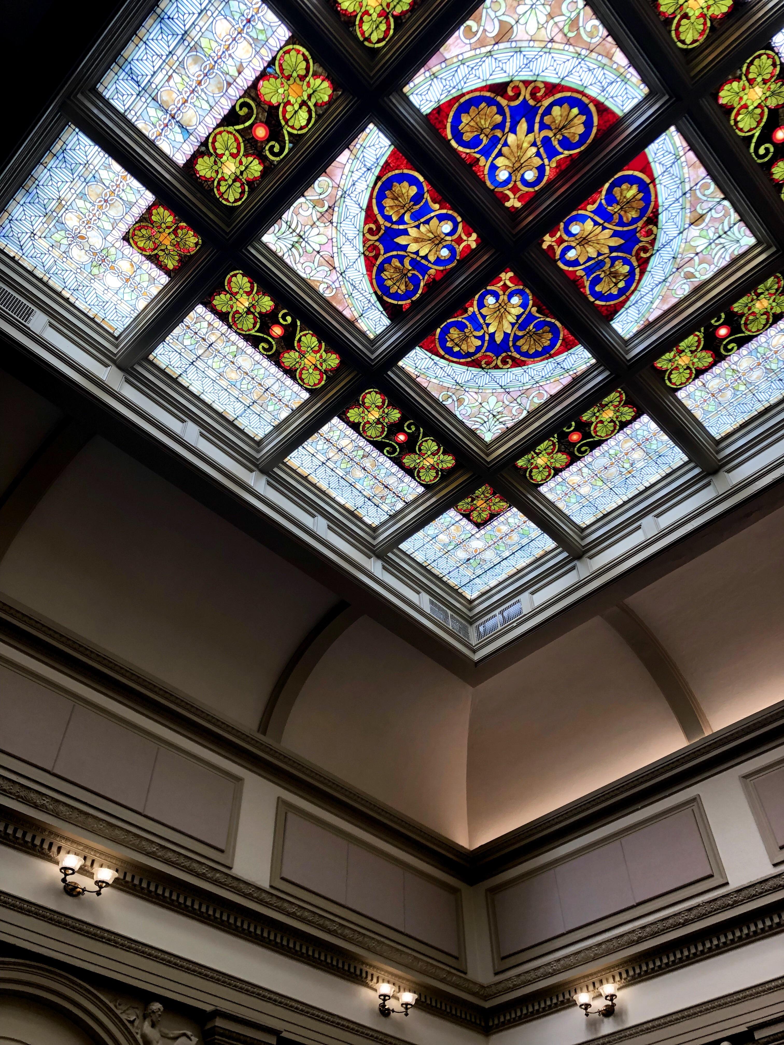 A stained glass skylight inside Burton Hall