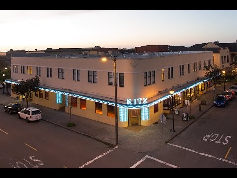 Ritz Building at night with neon lighting