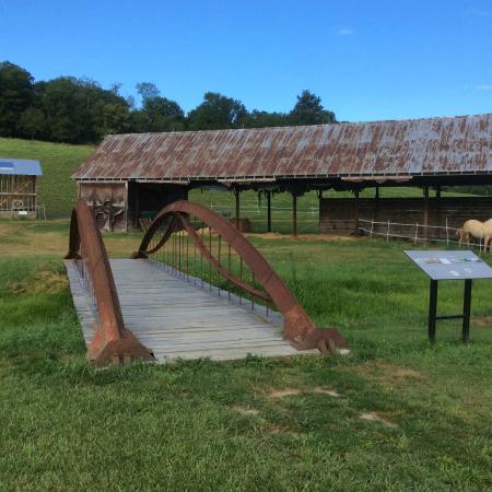 Visitors can wander the grounds of the house and encounter small footbridges and outbuildings.