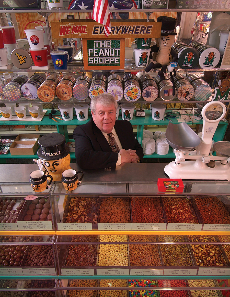 Former owner Doug Myers behind the counter of The Peanut Shoppe
