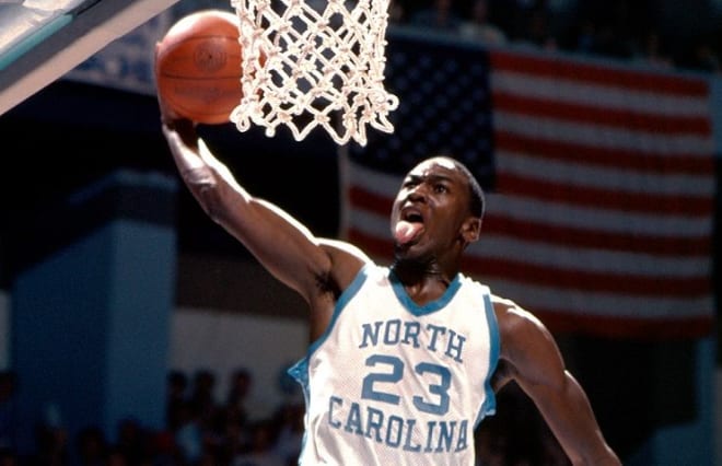 Jordan showed his tongue hanging out which ois what he did when entering the NBA.