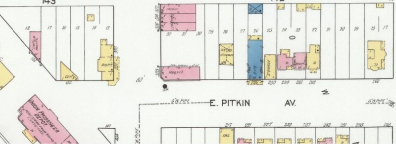 Stranges Grocery (stone, in blue) neighborhood by RR Depot in 1919 (Sanborn Map Company p. 11)