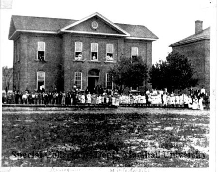 Students gathered outside the original Buffington School