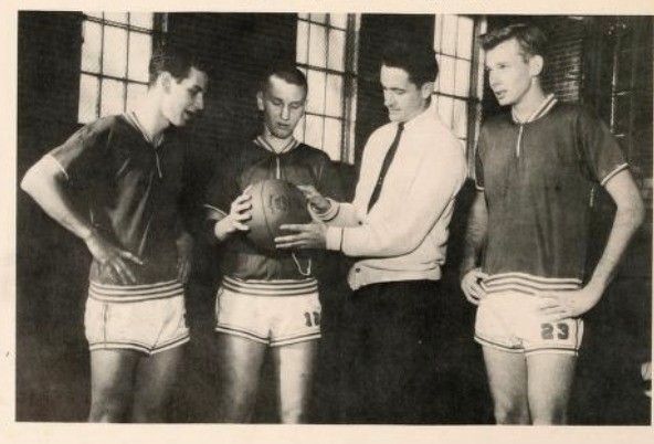 Coach Al McGuire and members of the Abbey Basketball team.