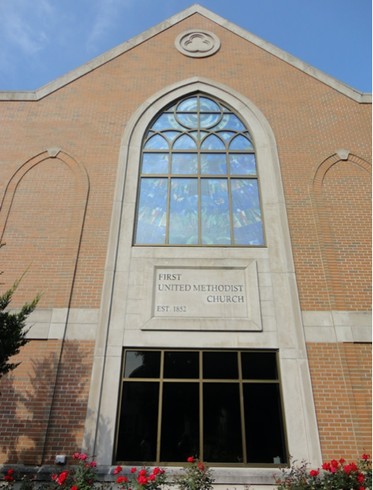 First United Methodist Church establishment plaque facing N. Main Street.