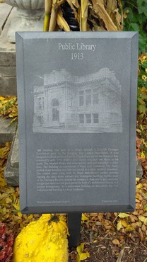 This marker, placed outside the Carnegie Free Library building, provides an overview of its history and significance.