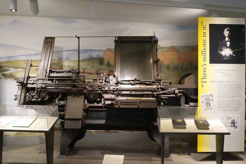 Mark Twain invested a fortune in James W Paige's automatic typesetting machine between 1880 and 1894. The most skilled human compositor could set 1,500 letters per hour. The Paige Compositor was six times faster, yet often broke down, negating its speed advantage. Moreover, the reliable though slightly slower, Merganthaler's Linotyope machine was invented at the same time and captured the market. Mark Twain was broke. The Paige Compositor weighs about 9,000 lbs and has more than 18,000 moveable parts. Paige assembled two working compositors. This is the 1887 model. The 1894 model was used as scrap-metal during World War II.