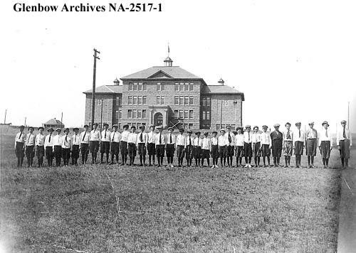 Students standing in front of the King Edward School, 1914