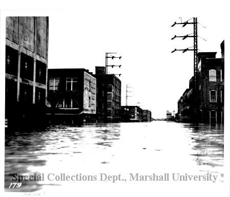 Looking down Second Avenue, with Gwinn Bros. Mill on the left, during the flood of 1937