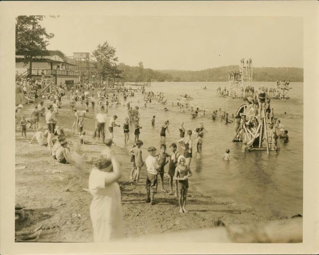 The beach part of the lake with water attractions for the family, 1930s Collection of City of Waterbury, Silas Bronson Library Digital Photos.