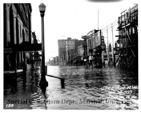 The bus depot is visible at right in this shot from the 1937 flood